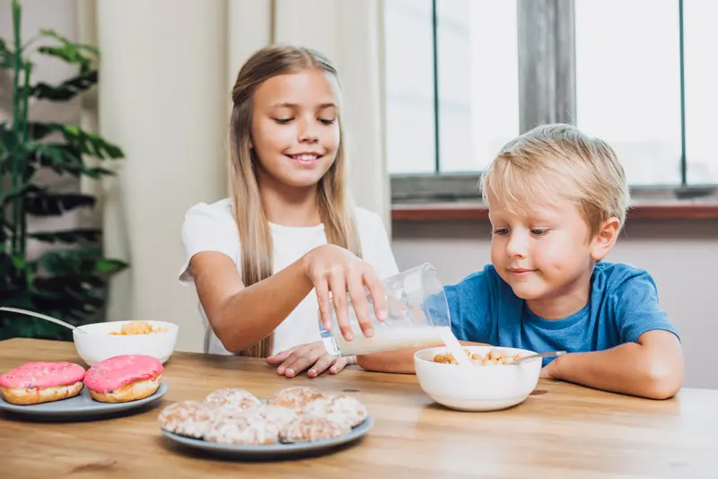 A family enjoying a healthy breakfast with dairy products